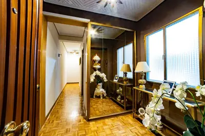a hallway with a large mirror in a room at Awesome apartment center Valencia in Valencia