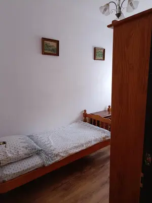a bedroom with a bed and a dresser at Burriana in Burriana