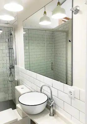 a bathroom with a sink and a mirror at Casa del Patriarca in Valencia