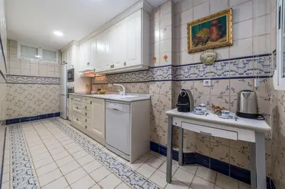 a kitchen with a sink and a counter top at My Loft 4 You Gran Via in Valencia