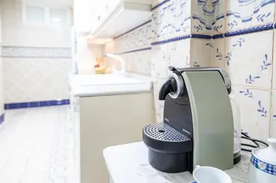 a coffee maker sitting on a counter in a kitchen at My Loft 4 You Gran Via in Valencia