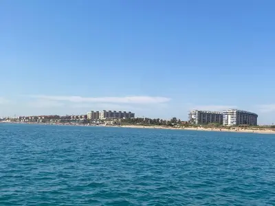 a view of a beach and buildings from the water at Avenida Mare Nostrum 7 Patacona Beach Breakfast items in the home in Valencia