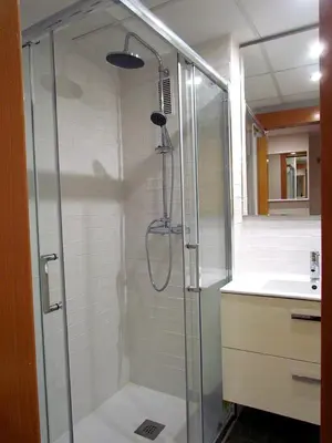a shower with a glass door in a bathroom at Your Home at Valencia, El Carme in Valencia