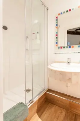 a bathroom with a shower and a sink at Apartamento Ruzafa Centro II in Valencia