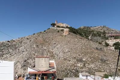 a hill with a house on top of it at Europa A- 12º-23 in Cullera