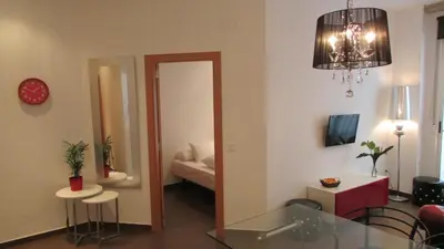 a bathroom with a toilet and a shower and a sink at Casa Cosy in Valencia