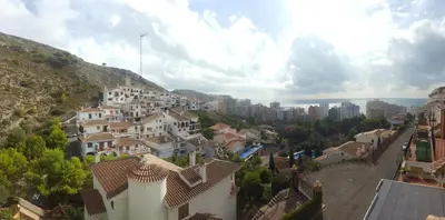 a view of a city with buildings on a hill at Urbanización Cullera Park - Carmen y Jose in Cullera