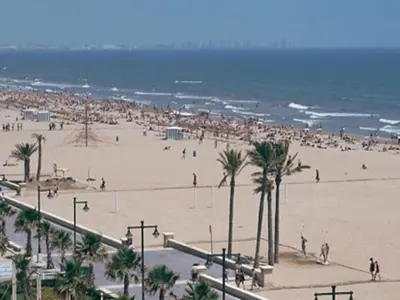 a large crowd of people on a beach at Apartamento Ciudad de las Ciencias 3 in Valencia