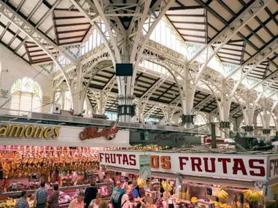 a group of people in a market in a building at Apartamento Ciudad de las Ciencias 3 in Valencia