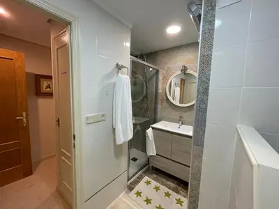 a bathroom with a shower and a sink at Varone in Requena
