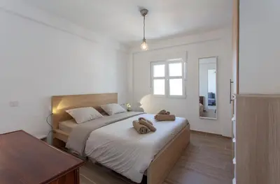 a bedroom with a bed with two teddy bears on it at Valencia Flat Rental Malvarrosa Beach zone in Valencia