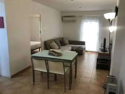 a living room with a table and a couch at Casco antiguo, el Carmen. in Valencia