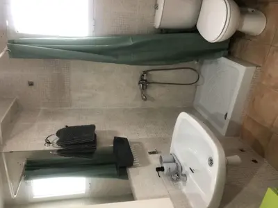a small bathroom with a sink and a toilet at Casco antiguo, el Carmen. in Valencia