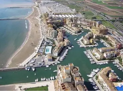 an aerial view of a harbor with boats in the water at Valencia Beach room with private bathroom coliving in Port Saplaya
