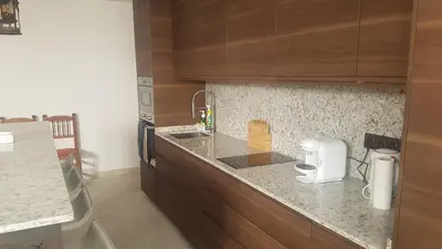 a kitchen with a sink and a counter top at el piso perfecto in Puerto de Sagunto