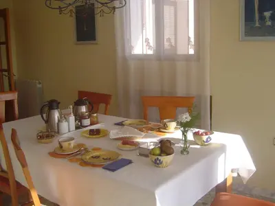 a white table with food on top of it at Casa Rural La Torreta in Corbera de Alcira