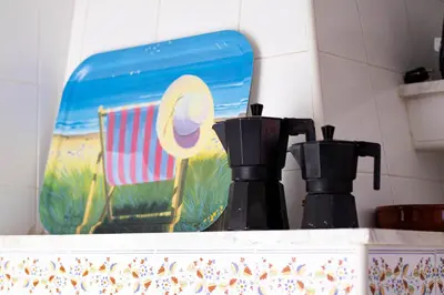 two coffee makers sitting on top of a counter at Casa Rural La Torreta in Corbera de Alcira