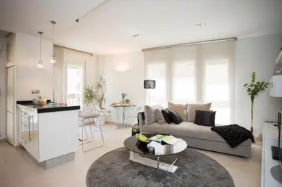 a living room with a couch and a table at SingularStays Poeta Querol in Valencia