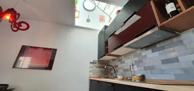 a kitchen with a sink and a counter top at L'Arbre in Valencia