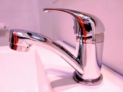 a chrome bathroom faucet on a bathroom sink at Valencian Dreams of the Proletariat in Valencia
