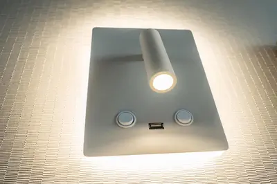 a light that is on top of a table at Sercotel Valencia Alameda 41 in Valencia