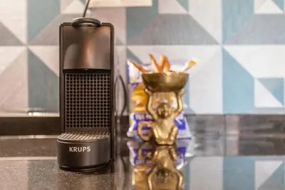 a hairbrush sitting on a counter next to a trophy at Mediterranean Flats Plaza Redonda in Valencia