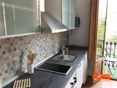 a kitchen with a sink and a counter top at CALLE CUENCA 2 in Valencia