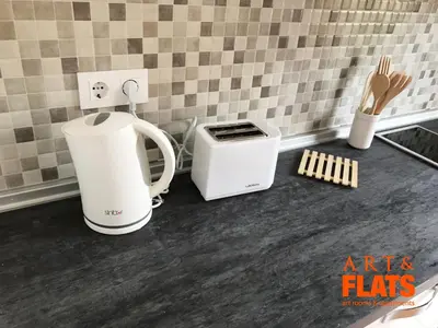 a kitchen counter with a coffee maker and a toaster at CALLE CUENCA 2 in Valencia