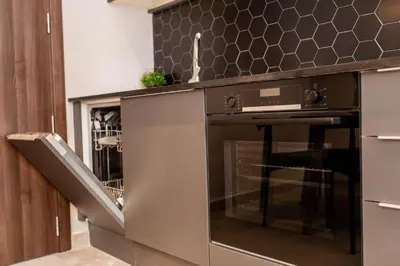 a kitchen with an oven in a kitchen at Ramirez Flats Valencia in Valencia