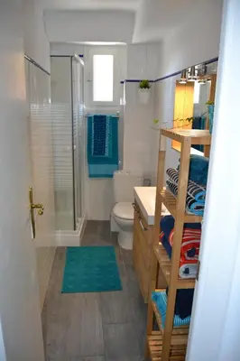 a bathroom with a shower and a toilet and a sink at Beach Malvarrosa, Cabañal, Wifi free. Ca' Micaela. in Valencia