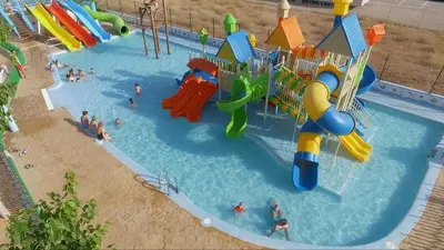 an image of a water park with people playing in it at Camping y Bungalows Monmar in Moncófar