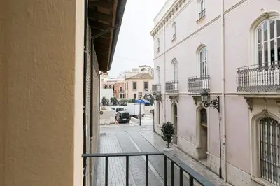 a view of a street from a balcony of a building at ApartUP L' Almoina in Valencia