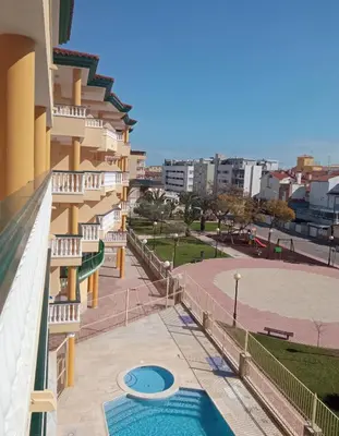 a view from the balcony of a building with a swimming pool at Apartamentos Satse Moncofa in Moncófar