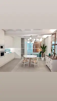 a living room with a table and a kitchen at Apartamento Frederick “Centrico y con Clase” in Valencia