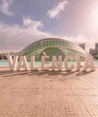 a large building with the word valencia in front of it at My House in Valencia