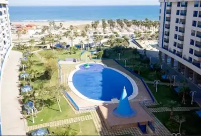 an overhead view of a swimming pool at a resort at PATACONA MARE NOSTRUM APARTMENT in Valencia