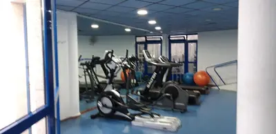 a gym with a bunch of exercise bikes in it at PATACONA MARE NOSTRUM APARTMENT in Valencia