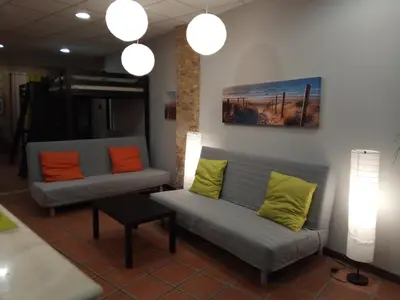 a room with a bunk bed and a locker at Espai Loft Valencia in Valencia