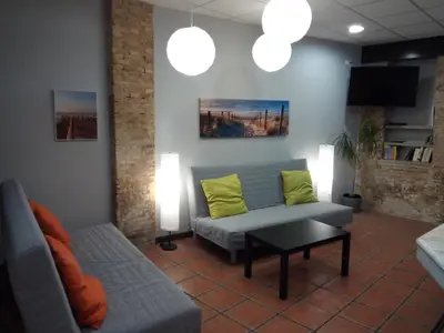 a bathroom with a toilet and a sink at Espai Loft Valencia in Valencia