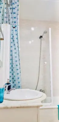 a bathroom with a sink and a shower at APARTAMENTO CERCA DE PLAYA Y MONTAÑA IDEAL FAMILIAS O RELAX in Puzol