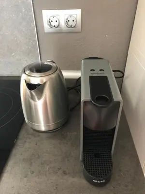 a blender and a toaster sitting on a counter at Colón Market Downtown in Valencia