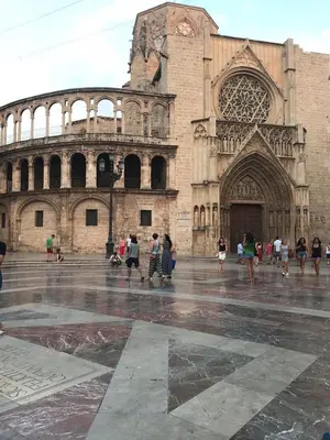 a group of people walking in front of a cathedral at Apartment near the BIO PARC in Valencia