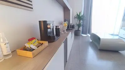 a kitchen with a counter with a coffee maker on it at Acogedor Apartamento in Valencia