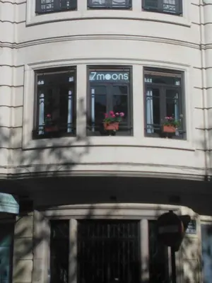 a building with two windows with flower pots on them at 7 Moons B&B in Valencia