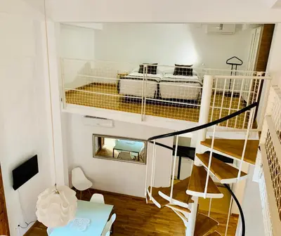 a dining room with a table and chairs at Palau de Palomar - PalomarGroup in Valencia