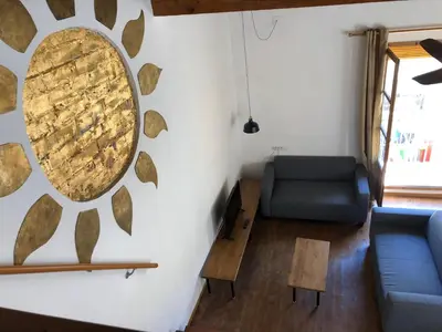 a living room with a couch and a table at Cozy en Blanch. Center in Valencia