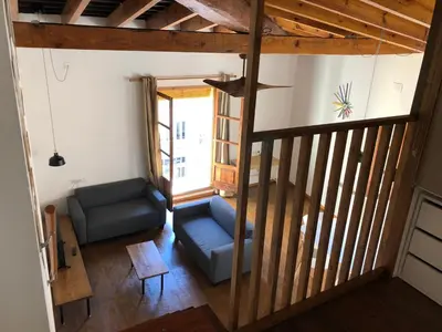 an overhead view of a living room with a couch at Cozy en Blanch. Center in Valencia