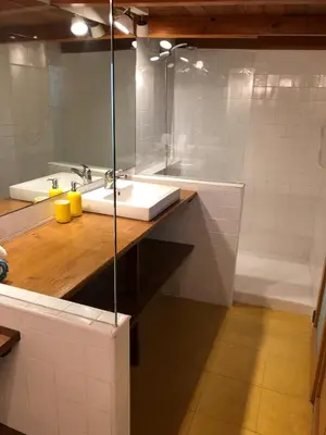 a bathroom with a sink and a bath tub at Cozy en Blanch. Center in Valencia