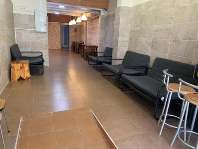a waiting room with couches and tables in a building at better Oh! in Valencia