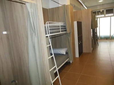 a room with two bunk beds and a hallway at better Oh! in Valencia